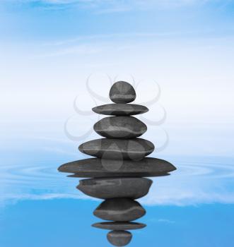 Zen stones balance concept isolated on white