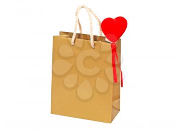 Holiday gift bag with red heart isolated on white background.