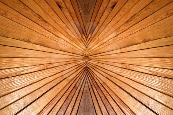 Symmetry and perspective abstract wooden slat background.