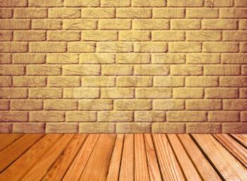 Indoor background with yellow brick wall and wooden plank floor taken closeup.