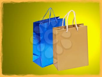 Blue and golden shopping bag on yellow background with frame border.
