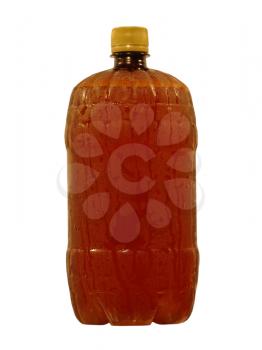 Wet brown plastic bottle with cool liquid taken closeup isolated on white background.