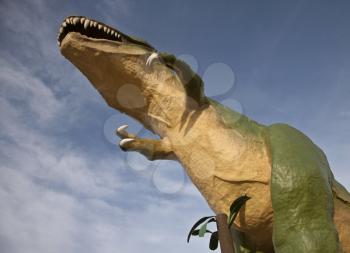 Dinasaur Statue Drumheller large with blue sky