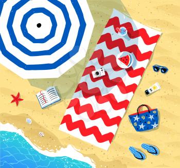 Top view vector illustration of beach mat, parasol and summer accessories lying on sand near sea surf.