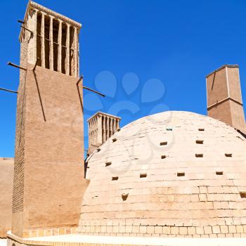 in iran   yazd  the old  wind tower construction  used to frozen water and ice