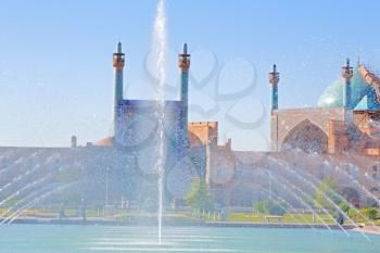 in iran old square mosque and fountain water backlight