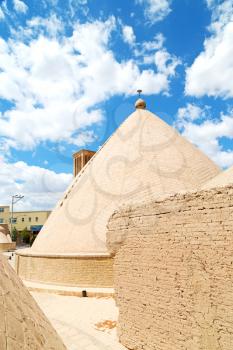 in iran  blur  yazd  the old  wind tower construction  used to frozen water and ice