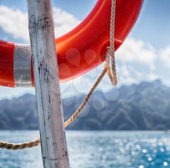blur  in  philippines   a buoy in boat neat the pacific ocean bokeh and mountain background
