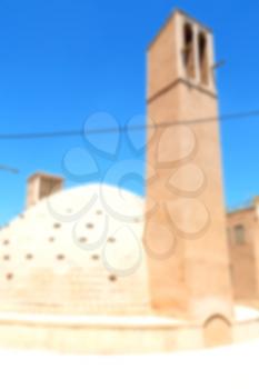 in blur iran   yazd  the old  wind tower construction  used to frozen water and ice