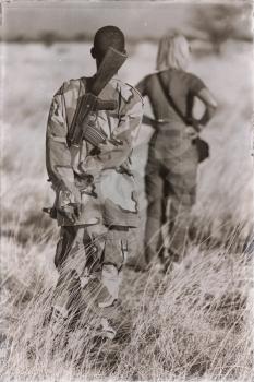  africa  in the land of ethiopia a black soldier and his gun looking the tourist