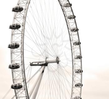 london eye in the spring sky and white clouds