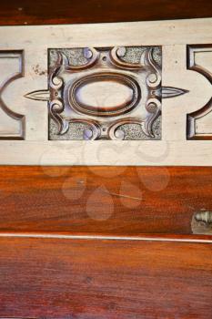  red abstract  house door    in italy   lombardy   column  the milano old        closed nail rusty
