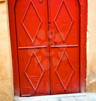 historical in  antique building door morocco      style africa   wood and metal rusty
