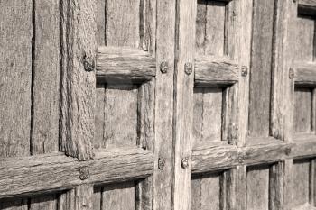 door in italy old ancian wood and trasditional  texture nail