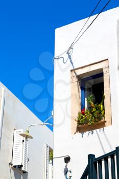 in the greece island window and door white  colors  old architecture 