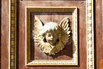 abstract angel   texture of a     brown  antique wooden     old door 