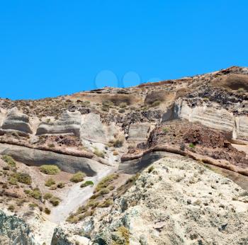 santorini europe greece and dry bush rock alone in the sky 