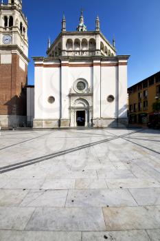 in  the busto arsizio  old   church  closed brick tower sidewalk italy  lombardy  