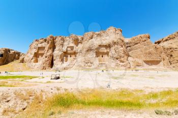 blur in iran near persepolis the old ruins historical destination monuments and mountain
