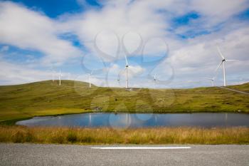 Modern windmills at the edge of world