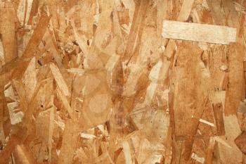 Wooden texture. Small pieces various thin plywood glued together as a monolithic board
