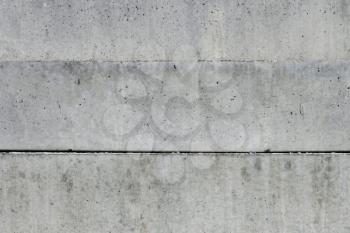 Three large massive concrete blocks composed horizontally