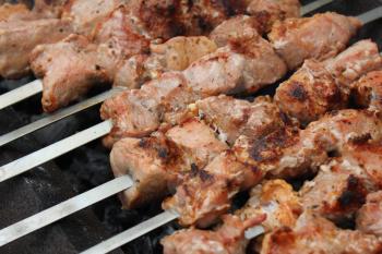 Meat porkis fried on the grill skewers at the coals 20450