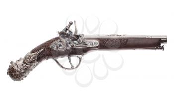 The ancient pistol isolated on white background