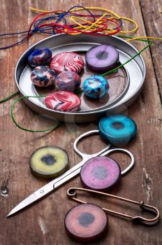 thread,beads and tools for needlework vintage background