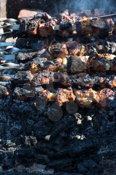 shish kebab on the extinct fuming fire.Selective focus
