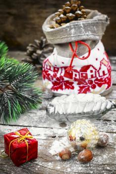 Christmas bag with gifts on the background of Christmas decorations
