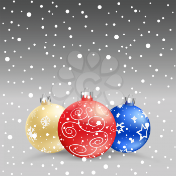 The multicolored christmas bauble and snow on the gray background