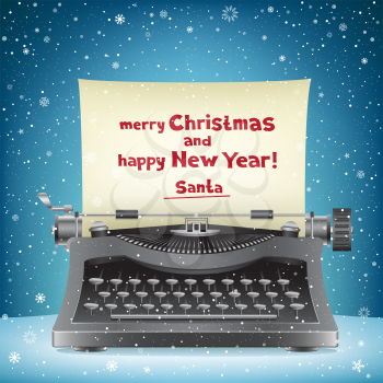 The typewriter on blue snow background and message from Santa Claus Merry Christmas and happy New Year