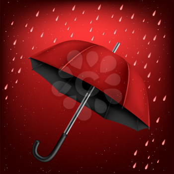 The red and black umbrella on rainy background