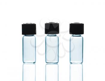 Empty Vials with and reflections, isolated on white background