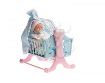 Baby doll in cradle isolated on white background, side angle, studio shot,  high depth of field
