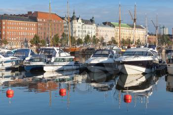 Yachts and motor boats moored in central marina of Helsinki, Finland