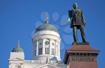 Statue of Russian czar Alexander II against the Cathedral. Senate Square, Helsinki, Finland