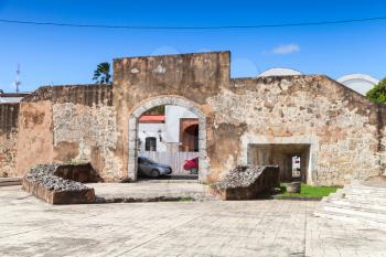 Ciudad Colonial, Santo Domingo, Dominican Republic, street view withold stone gateway