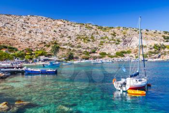Sailing yacht moored in Agios Nikolaos bay. Zakynthos island, Greece. Popular touristic destination for summer vacations