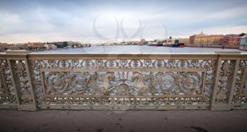 The metal fence on The Blagoveshchensky Bridge - the first permanent bridge built across the Neva River in Saint Petersburg, Russia