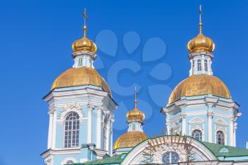 Orthodox St. Nicholas Naval Cathedral. Facade fragment with golden domes, St. Petersburg, Russia