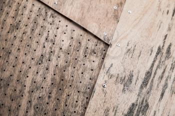 Grungy structure made of plywood sheets, background photo texture