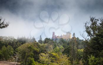 Landscape with Pena Palace on the top of the Sintra Mountains. Popular landmark of Portugal
