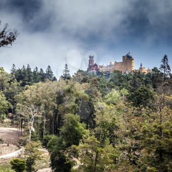 Square summer landscape with Pena Palace on the top of the Sintra Mountains. Municipality of Sintra, Portugal