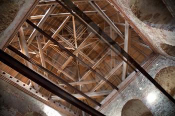 Inner construction of wooden roof it tower of ancient fortress (Kremlin) in Smolensk town, Russia