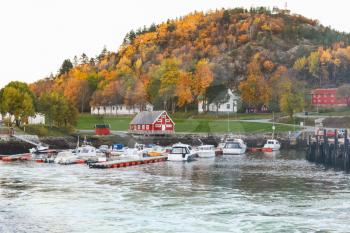 Coastal landscape of Hasselvika village in the municipality of Rissa in Sor-Trondelag county, Norway. Rural Norwegian landscape at autumn day