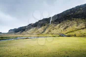 Landscape with river near Seljalandfoss waterfall, one of the most popular natural landmark of Iceland