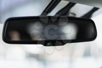 Car mirror with adaptive dimming system, auto brightness control