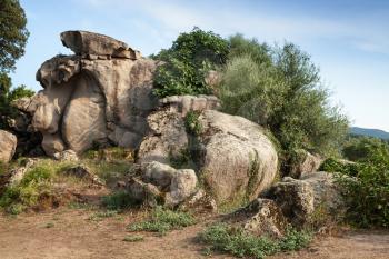 Summer landscape with stones of Filitosa, megalithic site in southern Corsica, France